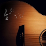 Наклейка рисунок с нотами на гитару
